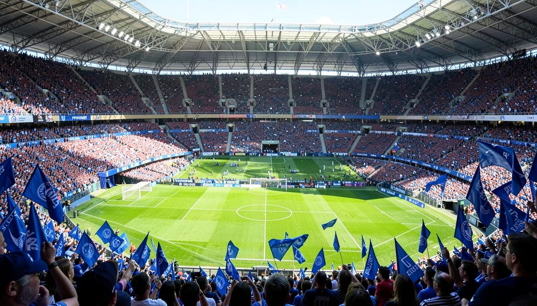 King Power Stadium interior on matchday, Leicester City blue flags waving in the crowd, the centre circle visible under bright afternoon sunlight