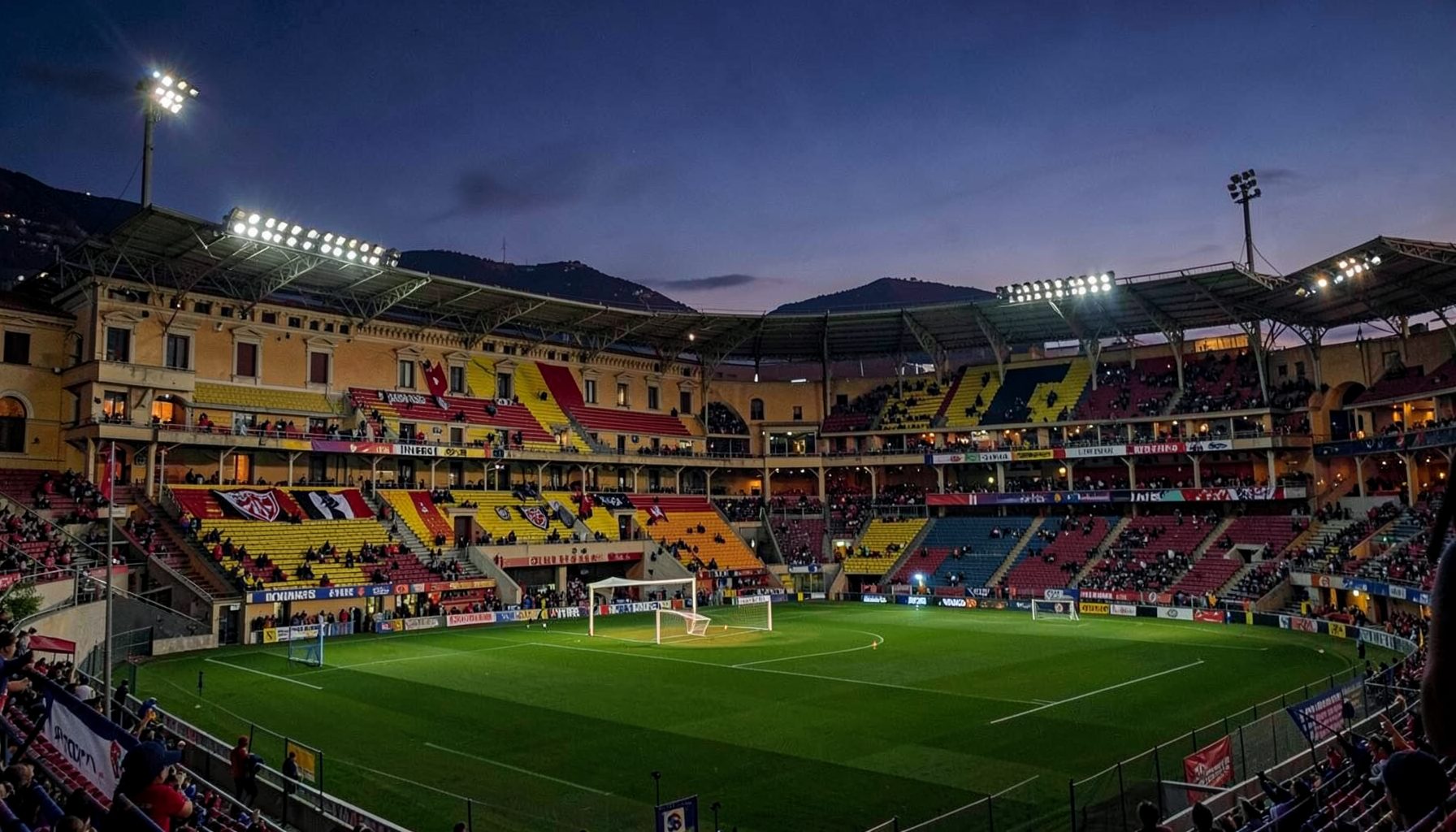 Lecce's yellow-and-red stripes clashing with Inter Milan's iconic blue-and-black, dramatic evening stadium scene in southern Italy